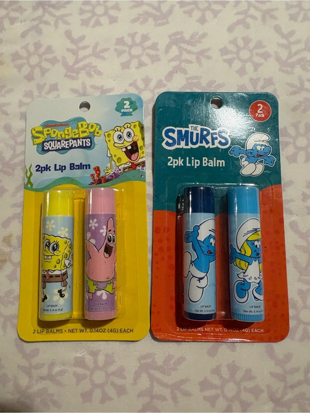 The Smurfs & SpongeBob 2-Pack Lip Balm Set — Blue and Yellow/Pink Variants